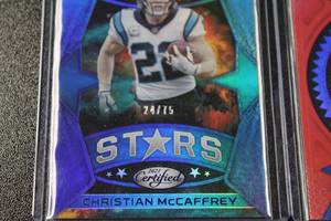 lot 162 image: 2021 Certified Stars Blue & Seal of Approval Orange Christian McCaffrey Lot