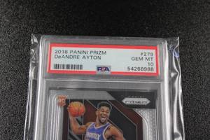 lot 171 image: 2018-19 Prizm DeAndre Ayton #279 Rookie Card PSA 10