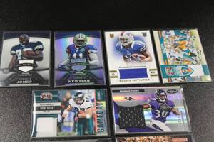 lot 213 image: Mixed Years Football Relic Lot  8 Relic Cards