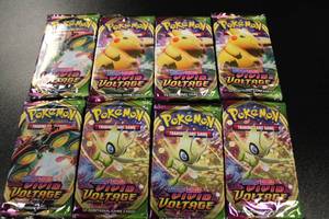 lot 320 image: Pokemon Sword & Shield Vivid Voltage Unopened Pack Lot  12 Unopened Packs