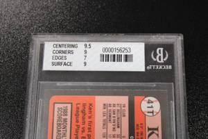 lot 402 image: 1989 Topps Traded Ken Griffey Jr. #41T Rookie Card BGS 8