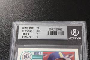 lot 403 image: 1989 Score RookieTraded Ken Griffey Jr #100T Rookie Card BGS 8.5