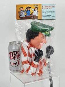 lot 138 image: RARE 1980s Muammar Gaddafi Punching Puppet