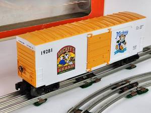 lot 317 image: Lionel Mickeys 8 Carrot High-Cube Box Car