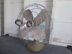 Vintage table top oscillating fan.