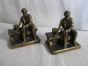 Lincoln sitting on a bench bookends