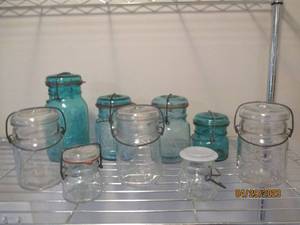 clear and green glass lidded Ball jars