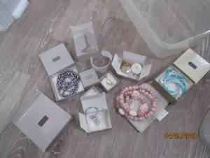 Collection of assorted Avon jewelry.