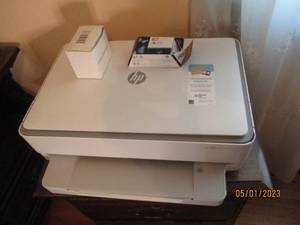 lot 137 image: HP Envy 6055 printer with cords and...