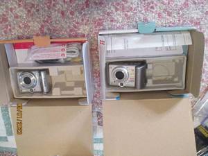 lot 149 image: Canon Powershot A70 and Canon Power...
