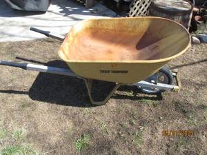 lot 194 image: True Temper all Metal wheelbarrow...