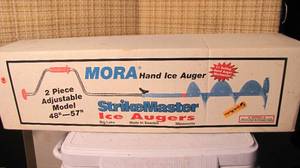 lot 68 image: mora NIB ice auger...