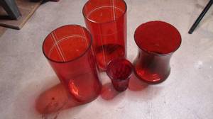 lot 99 image: red decorative vases...
