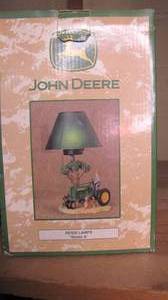 lot 272 image: John deer lamp...