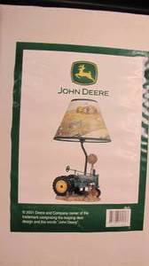 lot 274 image: John deer lamp...