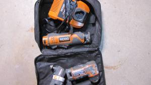 lot 290 image: Rigid angle drill with batteries an...