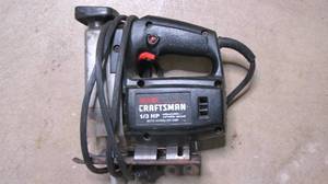 lot 304 image: craftsman 1hp Saber saw...
