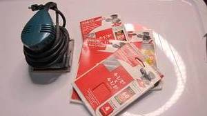 lot 312 image: makita finishing sander...