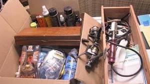 lot 324 image: fishing reels, gun cleaning kit, br...