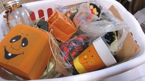 lot 333 image: basket full of holiday decor, quilt...