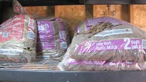lot 371 image: 2 bags full, 2 partial multch...