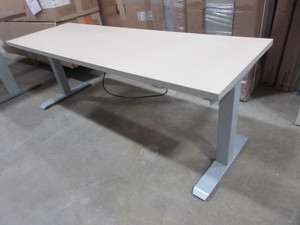 lot 213 image: HERMAN MILLER LAMINATE TOP, POWERED, ADJUSTABLE HEIGHT TABLE