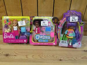 lot 32 image: Lot of THREE Barbies