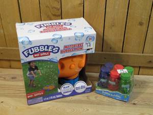 lot 14 image: FUBBLES NO SPILL MOTORIZED BUBBLE MOWER (includes 6 bubbles bottles)