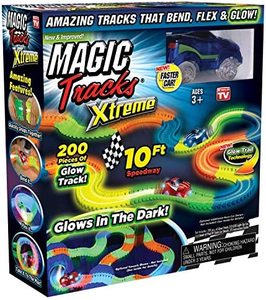 lot 70 image: Magic Tracks Deluxe Kit w 68 Accessories, 20 Glow-in-the-Dark Track & 2 Race Cars  Extra Parts & Accessories, Multi Set