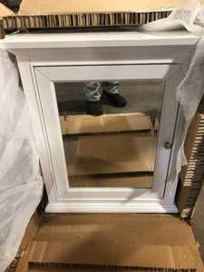 lot 25 image: 24 in. W x 28 in. H Framed Rectangular Beveled Edge Bathroom Vanity Mirror in White finish by Home Decorators Collection Customer Returns See Pictures