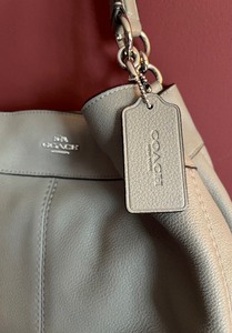 lot 64 image: Coach Lexy Refined Natural Pebble Leather Handbag