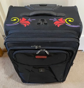 lot 67 image: Hand Painted Rosemaling Style Travel Pro Rolling Suitcase