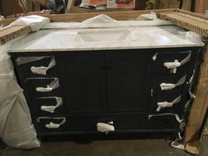 Merryfield 49 in. W x 22 in. D x 35 in. H Freestanding Bath Vanity in Dark Blue-Gray with Carrara White Marble Top by Home Decorators Collection Customer Returns See Pictures