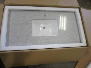 lot 417 image: 43 in x 22 in Engineered Stone Single Faucet Vanity Top in Gray (CHIP ON THE RIGHT FRONT CORNER)