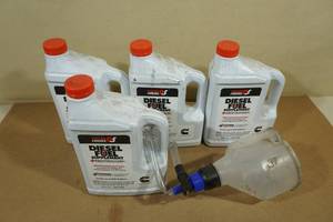 lot 19 image: 4 Power Service Diesel Fuel Supplement Winterizer