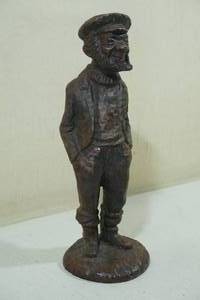 lot 193 image: Vintage Red Mill Mfg. Handcrafted Pecan Resin Sculpture Fisherman Figurine