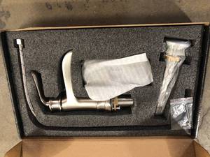 lot 33 image: Single-Handle Single Hole Bathroom Faucet Waterfall Vessel Sink Faucet Deck Mount in Brushed Nickel by LORDEAR Customer Returns See Pictures