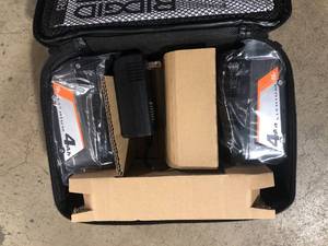 lot 54 image: 18V Lithium-Ion (2) 4.0 Ah Battery Starter Kit with Charger and Bag by RIDGID Customer Returns See Pictures
