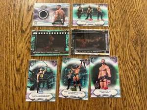 lot 49 image: Topps WWE #d & Patch Cards