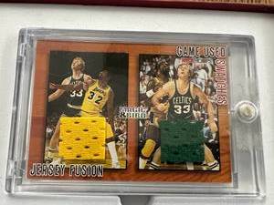lot 61 image: Jersey Fusion Magic Johnson & Larry Bird Card
