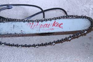 lot 61 image: Milwaukee Chain Saw
