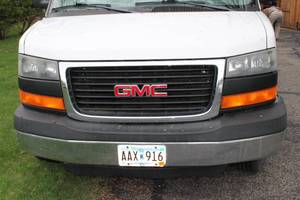lot 1 image: 2003 GMC Savana 2500 Cargo Van with Custom Shelving - White