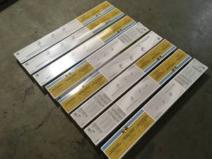 lot 14 image: Lot of 3-Light White Pinhole Cylinder Linear Track Lighting Kit by Hampton Bay  Customer Returns See Pictures