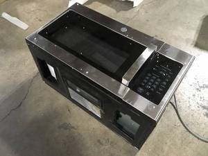 lot 23 image: Over- the - Range Microwave Oven Customer Returns See Pictures
