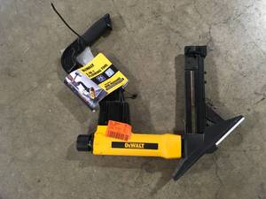 lot 37 image: 2-in-1 Pneumatic 15.5-Gauge and 16-Gauge Flooring Tool by DEWALT  Customer Returns See Pictures