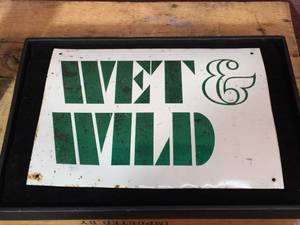 lot 138 image: Vintage Wet & Wild Custom Metal Sign