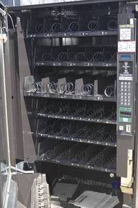 lot 26 image: Crane 147 Snack Vending Machine