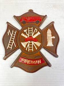 lot 42 image: Rusty Cast Iron Fireman Plaque 9 Inch Tall