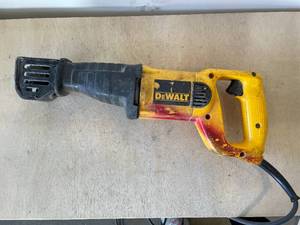 lot 7 image: Dewalt, DW 304P reciprocating saw.