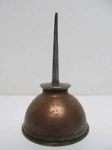 lot 63 image: Nice Antique Embossed FORD E Oil Can